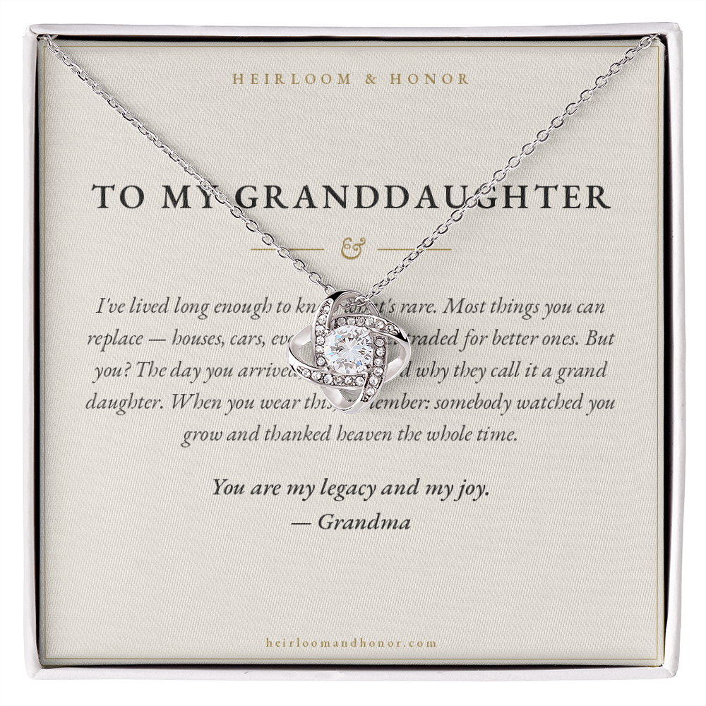To My Granddaughter love knot necklace displayed on keepsake message card in gift box, Heirloom & Honor