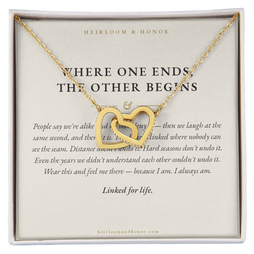 18k gold interlocking hearts necklace on Where One Ends The Other Begins message card