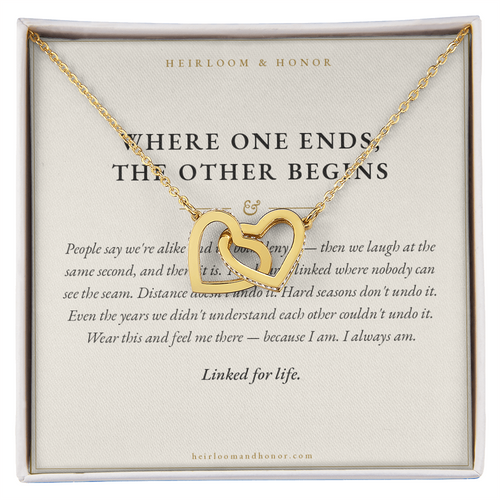 18k gold interlocking hearts necklace on Where One Ends The Other Begins message card